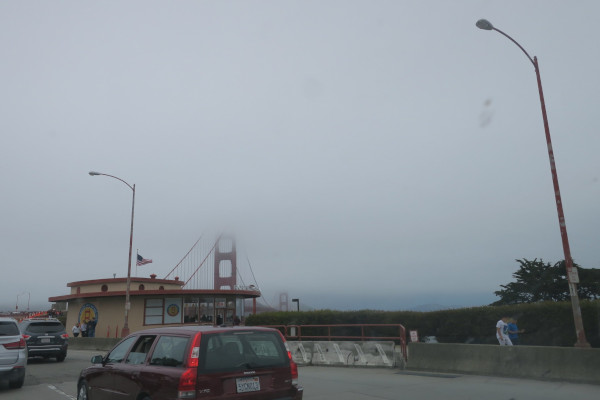 foggy view from traffic on the golden gate bridge