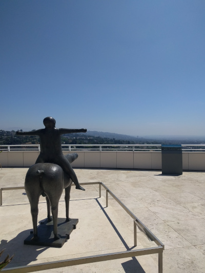 backside of a sculpture of a man riding a horse