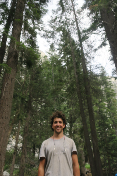 selfie in front of big trees